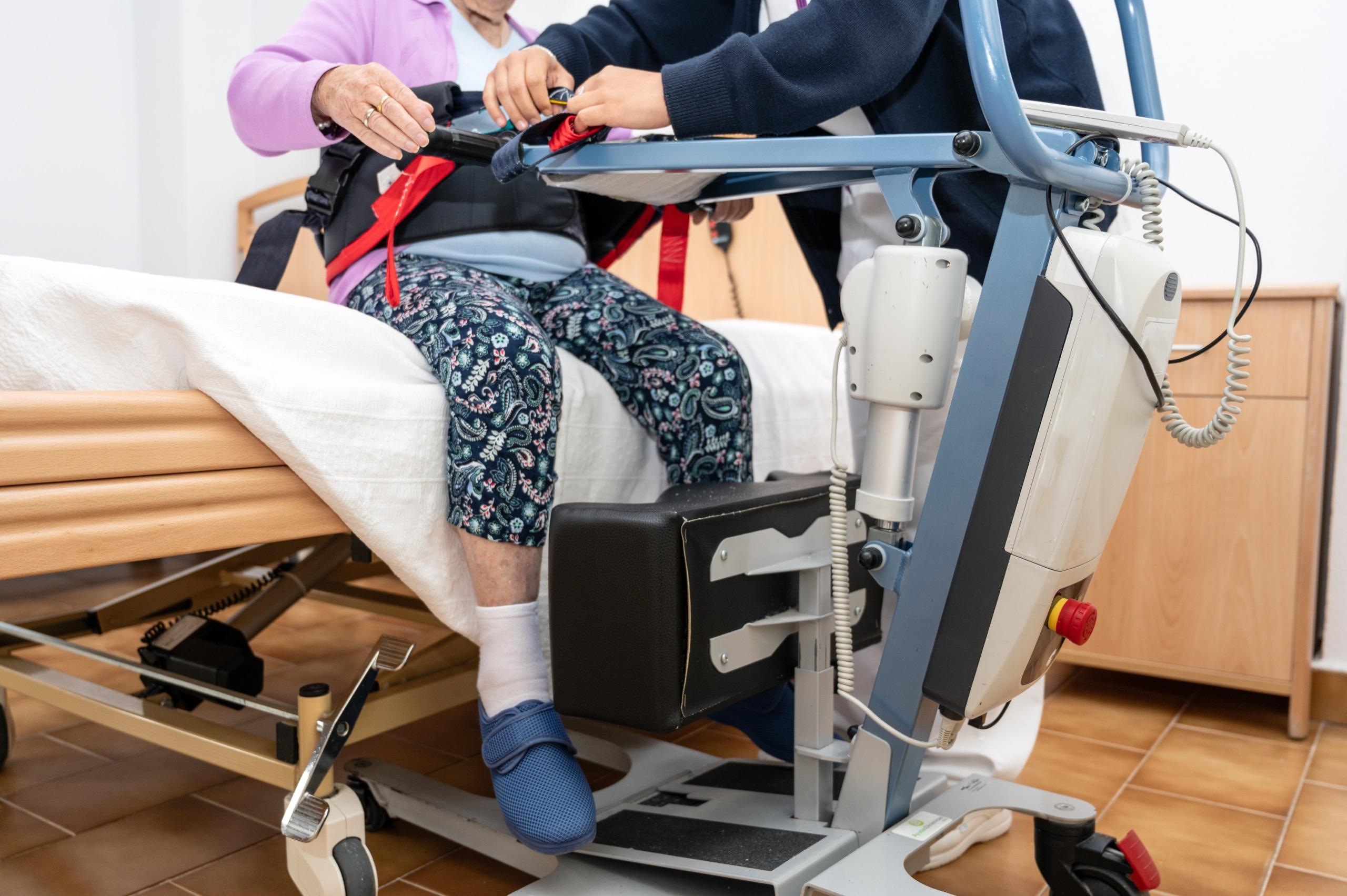 A team of healthcare professionals working with individuals in a therapeutic setting, emphasizing disability support and NDIS services.